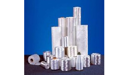 How does fiberglass insulation work to conserve energy?